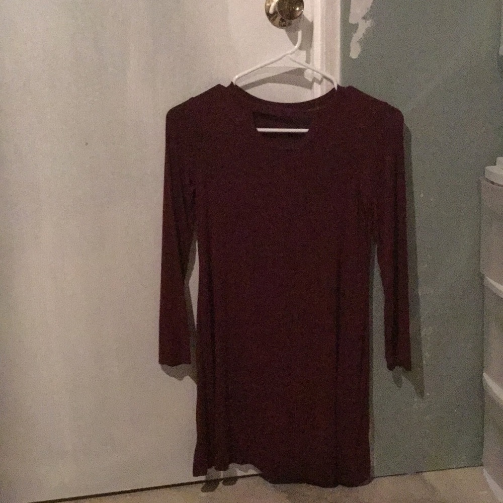 Medium length dark red long sleeve dress